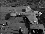 TBF-1 Avenger landing on Auxiliary Carrier USS Card bounced over the arresting cables, crashed the barrier, and stopped in an anti-aircraft gun tub, 9 Dec 1942 off San Diego, California, United States. 2 of 2.