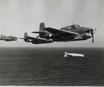 A training flight of TBF-1 Avengers lining up to drop practice torpedoes, late 1942, off the east coast of the United States. Photo 1 of 4.