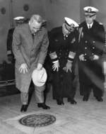President Truman aboard USS Missouri at the Brooklyn Navy Yard examining the deck marker on the spot where the surrender was signed in Tokyo Bay, Navy Day, 27 Oct 1945. Also Adm Jonas H Ingram and FAdm William D Leahy