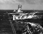 USS Yorktown (Essex-class) steaming in Task Group 58.4 en route to launch area off Kyushu, Japan, 19 Mar 1945. Photo likely taken from Intrepid with Langley behind Yorktown. Photo 2 of 2