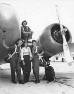 Four WASP pilots in front of a Cessna UC-78 Bobcat aircraft at Greenville AAF, Greenville, Mississippi, United States, Aug 1944. Deanie Bishop on the wing with Joan C Hutton, Emily Porter, and Phyllis M Johnson.