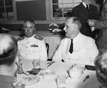 President Franklin Roosevelt, right, at lunch with Rear Admiral Alfred E Montgomery, commanding officer of Naval Air Station Corpus Christi, Texas, United States, 21 Apr 1943.