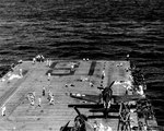Crewmen of the USS Wasp (Essex-class) celebrate news of the war’s end by sunbathing on the flight deck off Japan, mid Aug 1945; days before this section of the flight deck was badly damaged in a typhoon.