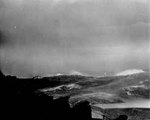 Heavy seas getting heavier as USS Wasp (Essex-class) steams into a typhoon south of Japan, 25 Aug 1945.