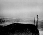 USS Wasp (Essex-class) in heavy sea as the ship steamed into a typhoon south of Japan, 25 Aug 1945.