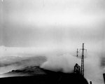 USS Wasp (Essex-class) taking white water over the bow in a typhoon south of Japan, 25 Aug 1945. She would soon take green water over the bow that collapsed 35 feet of the flight deck.