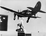SB2C Helldiver of Bombing Squadron VB-7 coming aboard USS Hancock off the United States east coast, mid-1944