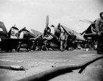 F6F Hellcats of Fighting Squadron VF-45 aboard Independence-class carrier USS San Jacinto off Kyushu, Japan, 18 Mar 1945. Note the open gun access panels in the fighters’ wings.