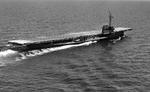 Training carrier USS Sable underway on Lake Michigan, United States, Jun 1945. Note the side-wheel propulsion.