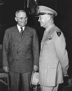 President Harry S Truman greeted by Supreme Allied Commander General Dwight D Eisenhower aboard the cruiser USS Augusta in the Port of Antwerp, Belgium, 15 Jul 1945, as Truman traveled to the Potsdam Conference.