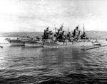 All three battleships of the New Mexico-class, USS Idaho, USS New Mexico, and USS Mississippi, moored abreast at Pearl Harbor, Territory of Hawaii, 17 Dec 1943