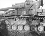 German Panzer Mark IV medium tank with three half-inch holes through the armor from M1 Bazooka anti-tank rockets, near French-German border, 2 Jan 1945. Note the wire mesh panels for defense against magnetic mines.