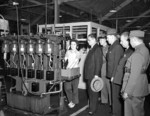 Chinese representatives touring the John Inglis and Company factory, Toronto, Canada, 20 Aug 1943