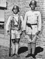 Chinese soldiers demonstrating their standard equipment, 1942