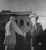 Lieutenant General Joseph Stilwell congratulating Major General Wheeler upon the latter being awarded a medal, India, Jan 1944