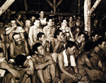 Japanese prisoners of war enjoying a comedic performance conducted by fellow POWs, Guam, Aug-Sep 1945