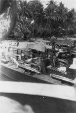 Elco 80-foot torpedo boats PT-149 and PT-122 at Tulagi, Solomon Islands, 1943. Note Mark XIII torpedoes and radar dome atop the mast.