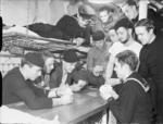 US Navy sailors playing cards, Londonderry, Northern Ireland, United Kingdom, date unknown