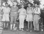Lieutenant General Joseph Stilwell (second from left) and Lieutenant General Hu Su (center) at Myitkyina, Burma, 18 Jul 1944