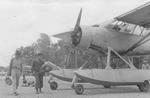 Lieutenant General Joseph Stilwell preparing to board an aircraft, Burma, 25 Jul 1944