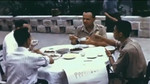 Milton Miles dining with other SACO personnel, Chongqing, China, 1944