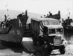 Bedford QL truck being loaded onto a LCT large landing craft during a training exercise, circa 1942, location unknown.