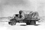 Canadian Chevrolet CMP C-60L 3-ton truck with early style cab design outside Wadi Sora in the Sahara Desert in southwestern Egypt, 1942-43.