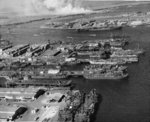 Aerial view of the Pearl Harbor repair basin with Ford Island beyond, Pearl Harbor, US Territory of Hawaii, 16 to 23 Jan 1946