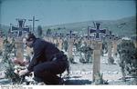 Horst Grund at a war cemetery in Krym (Crimea), Russia, circa Jan 1942