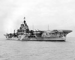 Starboard bow view of HMS Indomitable at anchor off Norfolk, Virginia, United States, 21 Nov 1941