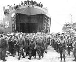 German prisoners-of-war captured at Anzio are offloaded from LST-351 at Naples, Italy in early 1944.