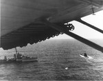 Destroyer HMS Malcolm approaching German submarine U-541 after the U-Boat surrendered pursuant to Germany’s surrender terms, 11 May 1945 off Portugal, photographed from a PBY from VPB-63.