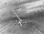 Returning from Vienna, Austria, B-24H Liberator “Scrappy” with the 725th Bomb Squadron trails smoke and is losing altitude east of Zagreb, Yugoslavia, 22 Aug 1944. The plane crashed near Zdenci, Yugoslavia