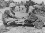 US Marine greeting a civilian woman, Okinawa, Japan, 1945
