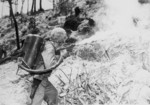 US Marine Corps 6th Division flamethrower in action, Okinawa, Japan, 1945