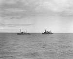 Cruiser USS Omaha (right) laying off the seized German blockade runner Odenwald in the South Atlantic, 6 Nov 1941. The Odenwald had been disguised as the US-flag ship Willmoto carrying rubber from Japan to Germany.