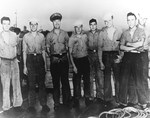 USS Pillsbury crew members who were the first party to board the German submarine U-505 after being abandoned by her crew, eastern Atlantic, 4 Jun 1944.