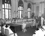Japanese Surrender ceremonies at the Government Building, Seoul, Korea, 9 Sep 1945. The Japanese delegation is on the right side of the table and the US representatives are on the left.