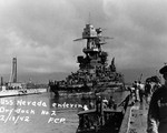 Battleship USS Nevada entering Pearl Harbor’s Drydock No. 2, 18 Feb 1942. Photo 1 of 2.