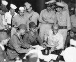Japanese RAdm Shigematsu Sakaibara signing the surrender of Wake Island to US Marine BGen Lawson Sanderson aboard USS Levy, 4 Sep 1945. Care was made to ensure the Japanese surrendered Wake to the Marines.