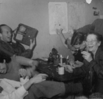 Dutch Resistance members celebrating upon hearing the news of Adolf Hitler