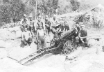 75mm howitzer and crew of US 5332nd Brigade (Provisional), Burma, 1945; Hutchinson, ?, Ferguson, Hundinski, Parkhill, Harper, ?, Beauchene, Fulton, Keppner, Singleton