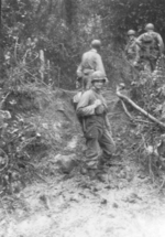 Members of US 5332nd Brigade (Provisional) Bristow Hopper (looking at camera) and Bob Compton (immediately behind), Burma, 1945