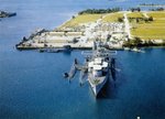 USS Proteus with submarines, Apra Harbor, Guam, circa 1960s