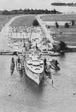 USS Proteus with two submarines, Apra Harbor, Guam, early 1970s