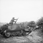 A 2-inch mortar being fired from a Universal Carrier in Britain, 10 May 1943