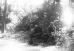 Members of US 5332nd Brigade (Provisional) Colonel James Donovan and Gus Edwards resting on a trail, Burma, 1945