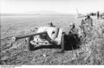 Troops of PK XI. Fliegerkorps with a 5 cm PaK 38 anti-tank gun, Tunisia, 1943