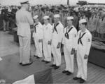 Captain Carl Holden at an award ceremony aboard USS New Jersey, 24 Jul 1943, photo 1 of 2