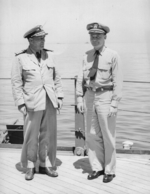 Captain Carl Holden (right) and an unidentified officer aboard USS New Jersey, date unknown